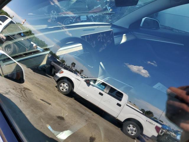 Photo 9 from auction – 2021 TESLA MODEL 3 with VIN 5YJ3E1EA4MF091707