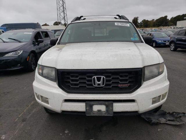 Photo 5 from auction – 2014 HONDA RIDGELINE with VIN 5FPYK1F77EB002951