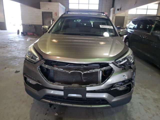 Photo 5 from auction – 2018 HYUNDAI SANTA FE S with VIN 5NMZU3LB9JH066994