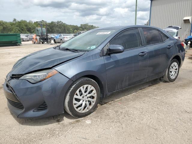 TOYOTA COROLLA L 2017 with VIN 5YFBURHE0HP695986 - Photo from auction