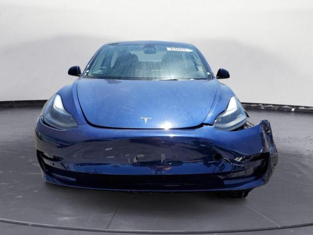Photo 5 from auction – 2022 TESLA MODEL 3 with VIN 5YJ3E1EBXNF305206