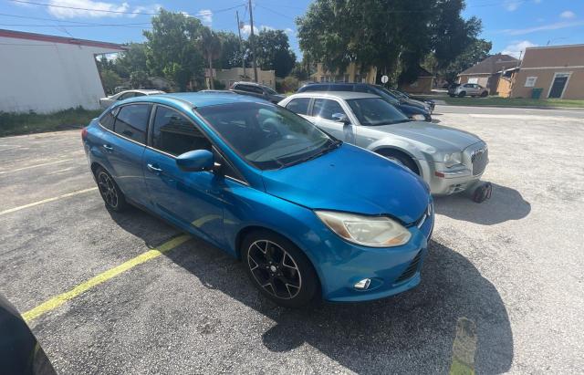 FORD FOCUS SE 2012 with VIN 1FAHP3F2XCL254588 - Photo from auction