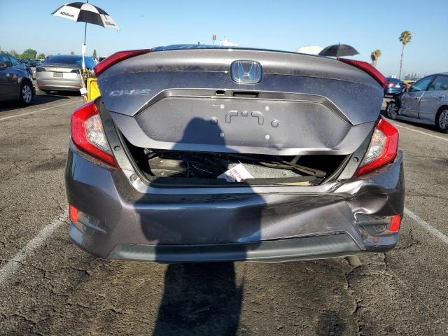 Photo 6 from auction – 2018 HONDA CIVIC LX with VIN 2HGFC2F50JH568070
