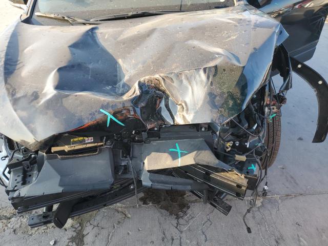 Photo 11 from auction – 2022 TOYOTA COROLLA CR with VIN 7MUDAABG2NV028133