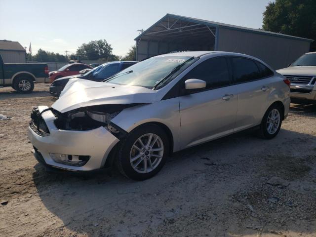 FORD FOCUS SE 2018 with VIN 1FADP3F24JL279904 - Photo from auction