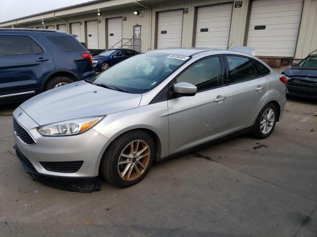 FORD FOCUS SE 2018 with VIN 1FADP3F24JL231318 - Photo from auction