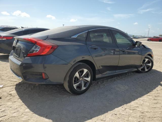 Photo 3 from auction – 2019 HONDA CIVIC LX with VIN 19XFC2F60KE045359