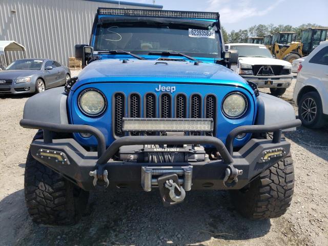 Photo 5 from auction – 2015 JEEP WRANGLER U with VIN 1C4BJWDG1FL506413