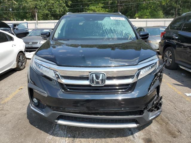 Photo 5 from auction – 2021 HONDA PILOT TOUR with VIN 5FNYF5H64MB007113