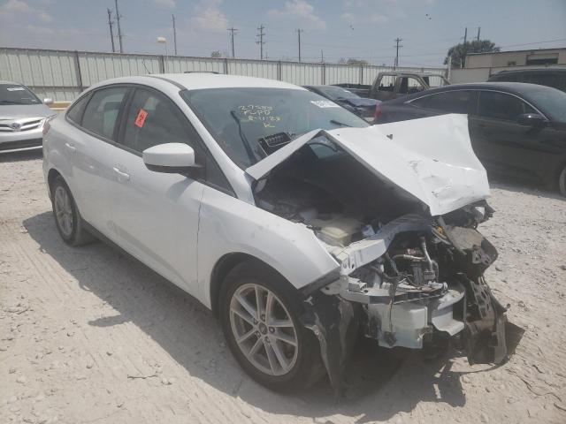 Foto 4 de la subasta – 2018 FORD FOCUS SE con VIN 1FADP3FE5JL268873