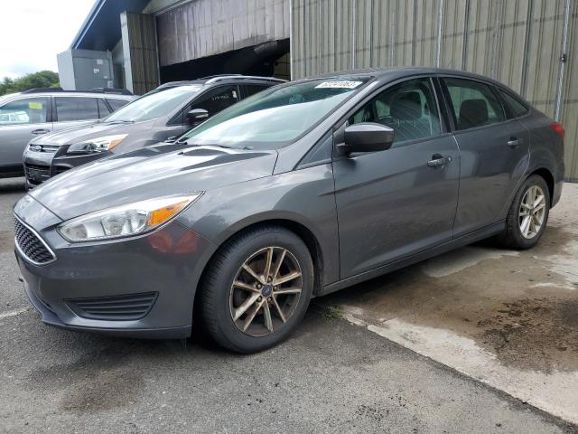 FORD FOCUS SE 2018 with VIN 1FADP3F20JL318276 - Photo from auction