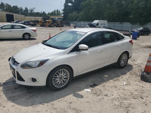 FORD FOCUS TITA 2014 with VIN 1FADP3J22EL203160 - Photo from auction
