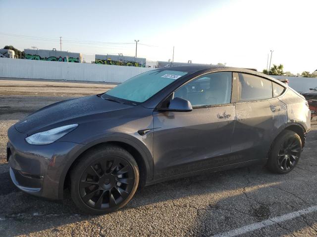 TESLA MODEL Y 2022 with VIN 7SAYGDEE4NF366632 - Photo from auction