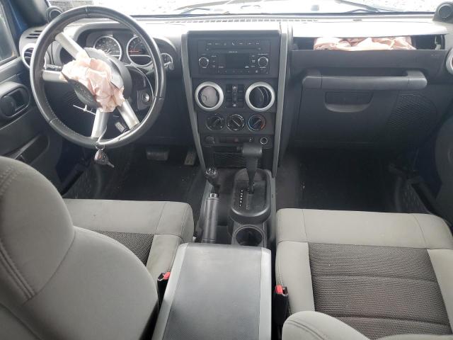 Photo 8 from auction – 2010 JEEP WRANGLER U with VIN 1J4BA5H17AL214154