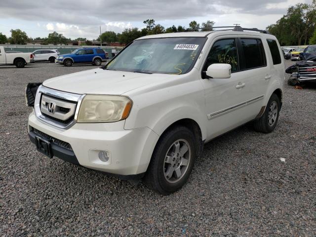 HONDA PILOT TOUR 2011 with VIN 5FNYF3H9XBB035347 - Photo from auction