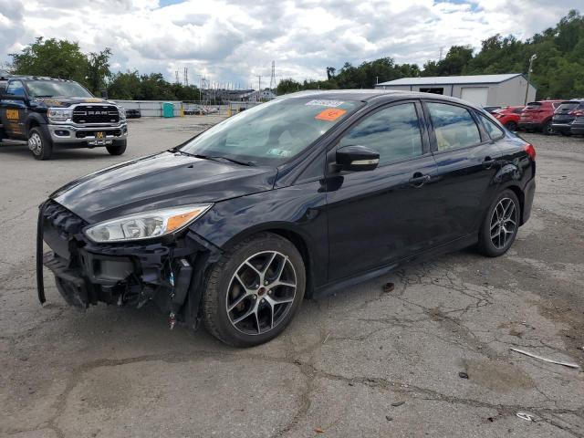 FORD FOCUS SE 2016 with VIN 1FADP3F20GL245970 - Photo from auction