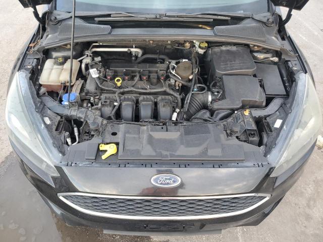 Photo 11 from auction – 2015 FORD FOCUS SE with VIN 1FADP3F29FL218832