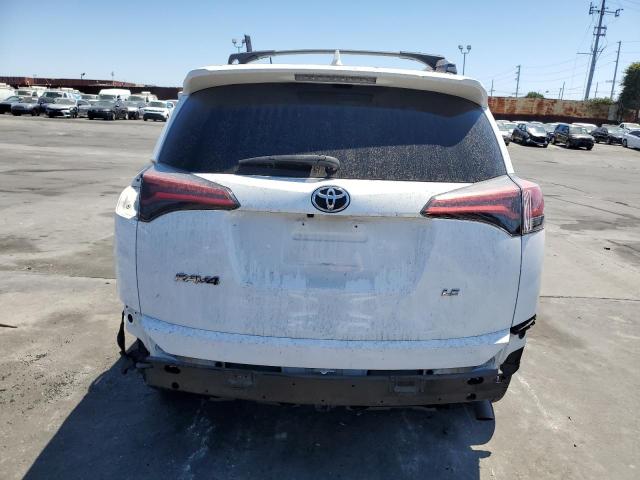 Photo 6 from auction – 2018 TOYOTA RAV4 LE with VIN 2T3ZFREV8JW481871