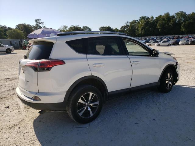 Photo 3 from auction – 2016 TOYOTA RAV4 XLE with VIN 2T3WFREV5GW250762