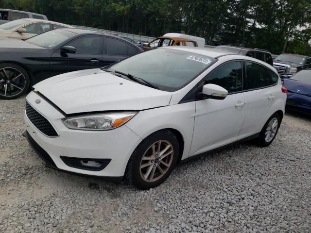 FORD FOCUS SE 2015 with VIN 1FADP3K22FL282250 - Photo from auction
