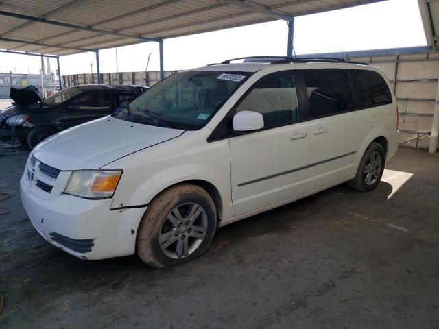 DODGE GRAND CARA 2010 with VIN 2D4RN6DX5AR455567 - Photo from auction