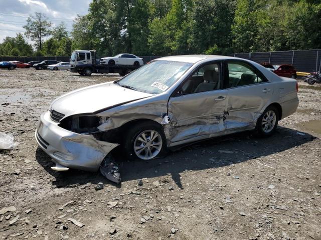 TOYOTA CAMRY LE 2004 with VIN 4T1BF32KX4U076858 - Photo from auction