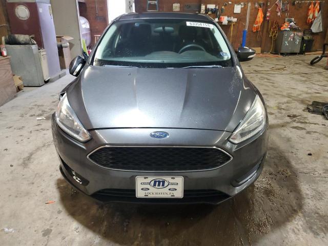 Photo 5 from auction – 2015 FORD FOCUS SE with VIN 1FADP3F23FL217403