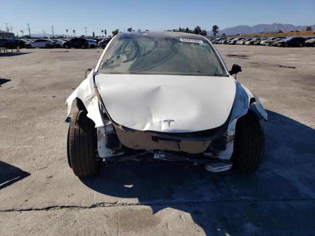 Photo 5 from auction – 2022 TESLA MODEL 3 with VIN 5YJ3E1EAXNF297535