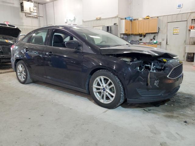 Foto 4 de la subasta – 2018 FORD FOCUS SE con VIN 1FADP3F23JL324315