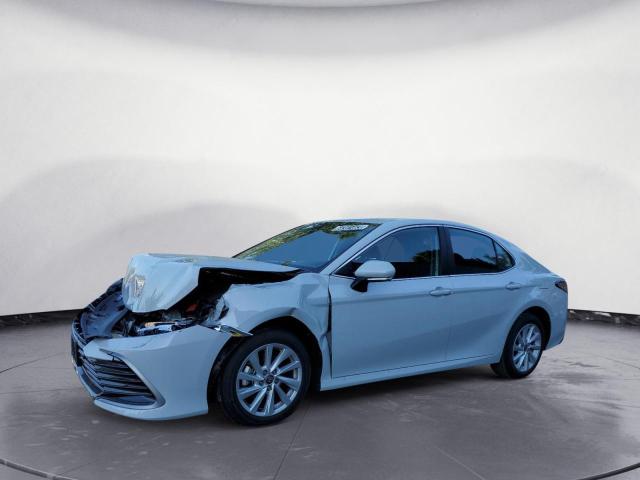 TOYOTA CAMRY LE 2023 with VIN 4T1C11AK2PU160850 - Photo from auction