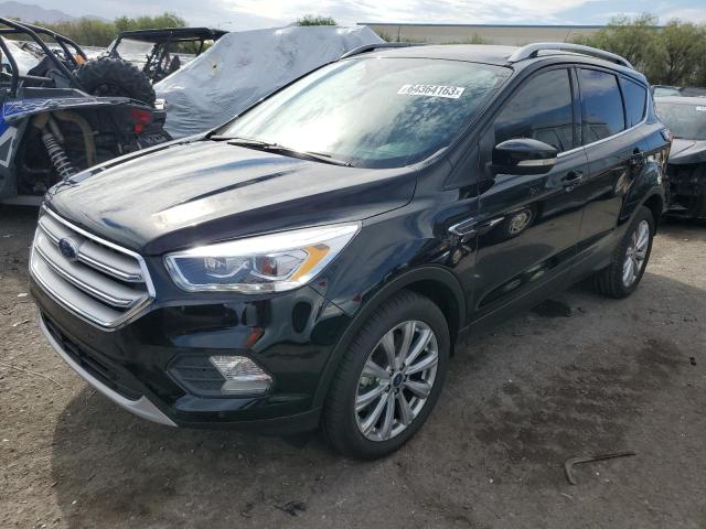 FORD ESCAPE TIT 2018 with VIN 1FMCU9J98JUC35982 - Photo from auction