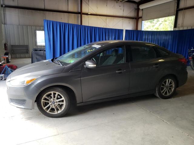 FORD FOCUS SE 2016 with VIN 1FADP3F26GL288421 - Photo from auction