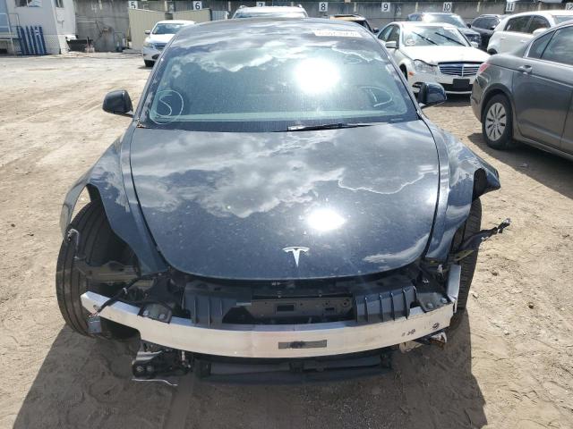 Photo 5 from auction – 2022 TESLA MODEL 3 with VIN 5YJ3E1EA4NF337236