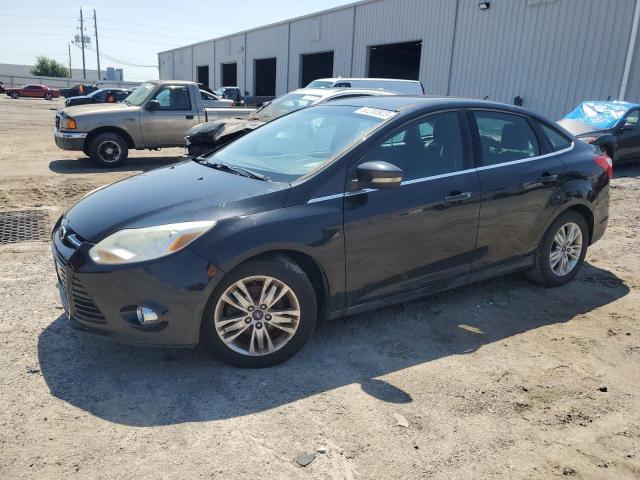 FORD FOCUS SEL 2012 with VIN 1FAHP3H29CL374718 - Photo from auction