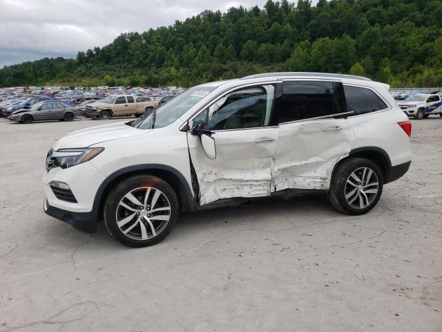HONDA PILOT TOUR 2018 with VIN 5FNYF6H91JB015102 - Photo from auction