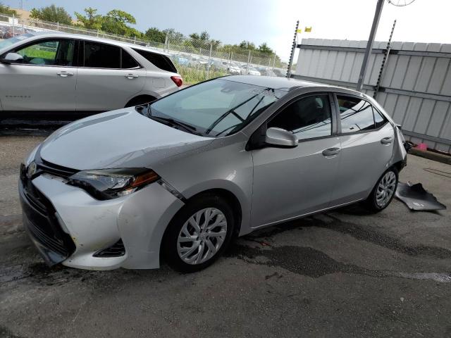 TOYOTA COROLLA L 2017 with VIN 5YFBURHE8HP723260 - Photo from auction
