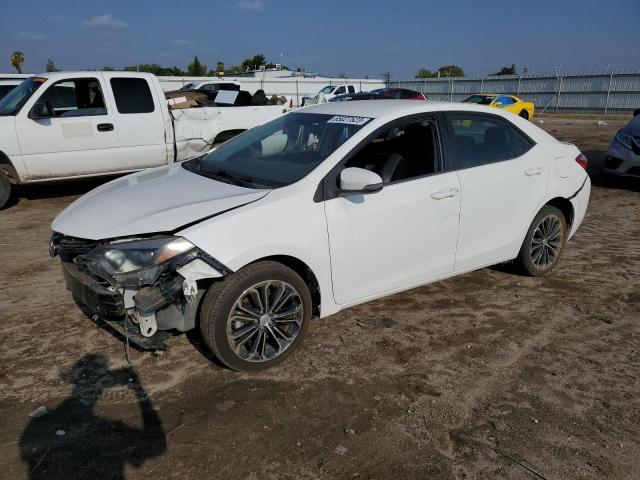 TOYOTA COROLLA L 2015 with VIN 5YFBURHE4FP310376 - Photo from auction