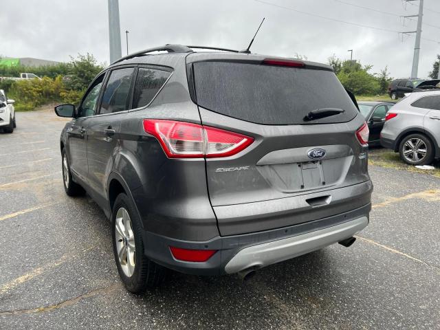 Photo 3 from auction – 2014 FORD ESCAPE SE with VIN 1FMCU9GX9EUA33857