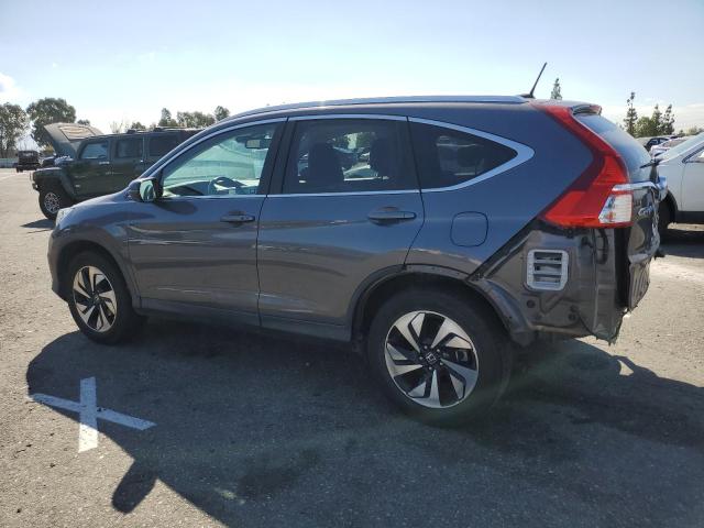 Photo 2 from auction – 2015 HONDA CR-V TOURI with VIN 5J6RM4H92FL076309