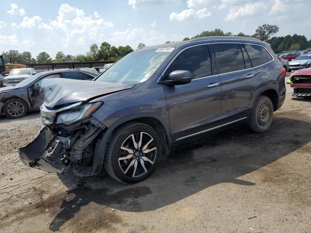 HONDA PILOT TOUR 2019 with VIN 5FNYF5H69KB020422 - Photo from auction