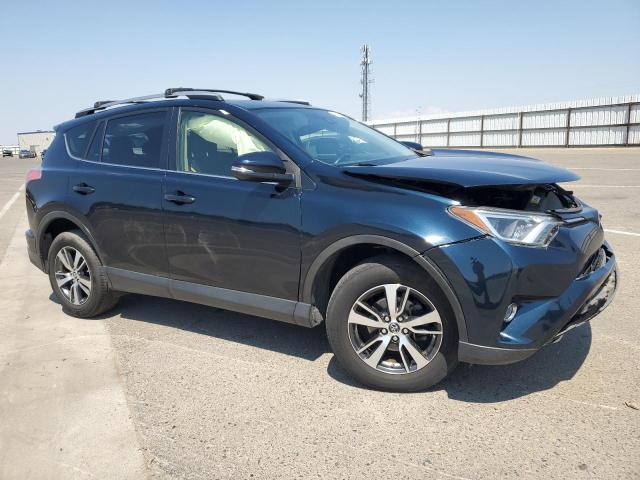 Photo 4 from auction – 2017 TOYOTA RAV4 XLE with VIN JTMWFREVXHD100953