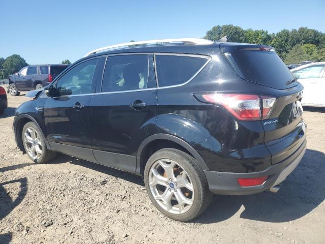 Photo 2 from auction – 2018 FORD ESCAPE TIT with VIN 1FMCU0J98JUD50058