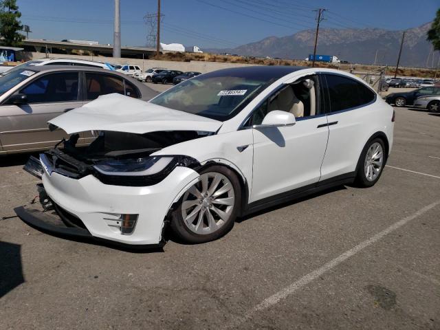 TESLA MODEL X 2018 with VIN 5YJXCDE23JF113662 - Photo from auction