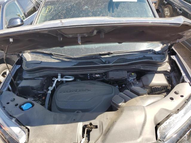 Photo 12 from auction – 2021 HONDA PASSPORT E with VIN 5FNYF8H53MB041987