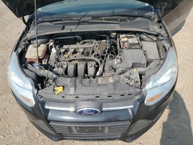 Foto 11 de la subasta – 2014 FORD FOCUS S con VIN 1FADP3E23EL420369