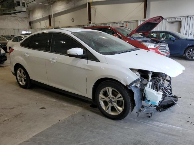 Photo 4 from auction – 2013 FORD FOCUS SE with VIN 1FADP3F24DL309049