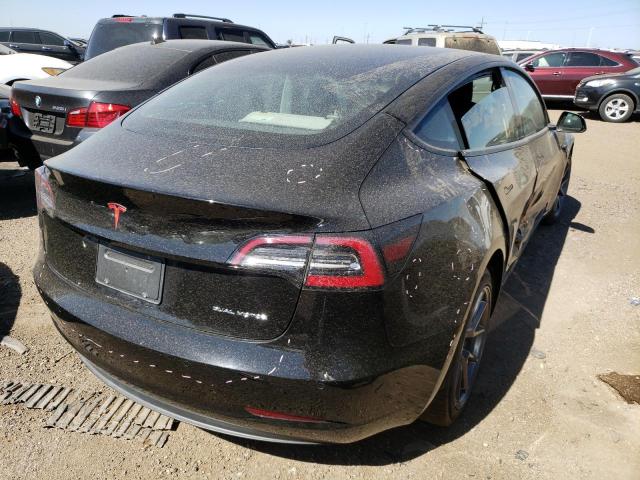 Снимка 3 от търг – 2021 TESLA MODEL 3 с VIN 5YJ3E1EB8MF050635