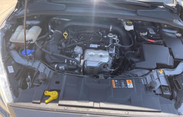 Photo 7 from auction – 2018 FORD FOCUS SE with VIN 1FADP3FE8JL216332
