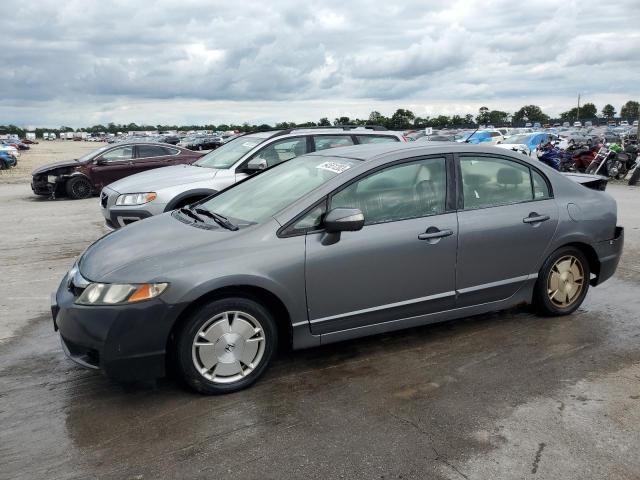 HONDA CIVIC HYBR 2010 with VIN JHMFA3F23AS004453 - Photo from auction