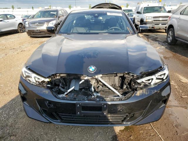 Photo 5 from auction – 2023 BMW 330XI with VIN 3MW89FF01P8D34943